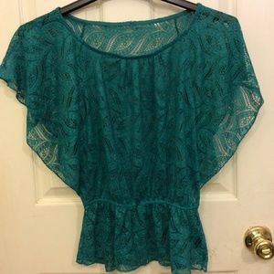 Wear over teal green blouse